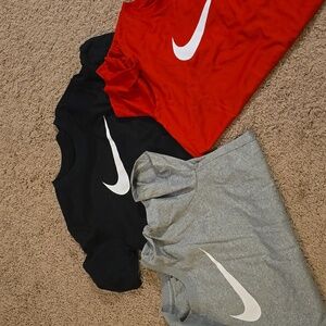 Nike Swoosh T-Shirts in Black, Gray, and Red